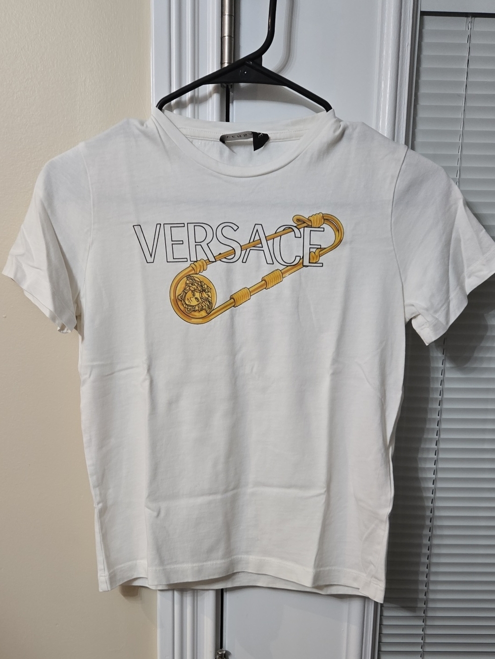 Versace White Tee with Gold Safety Pin Graphic Girls